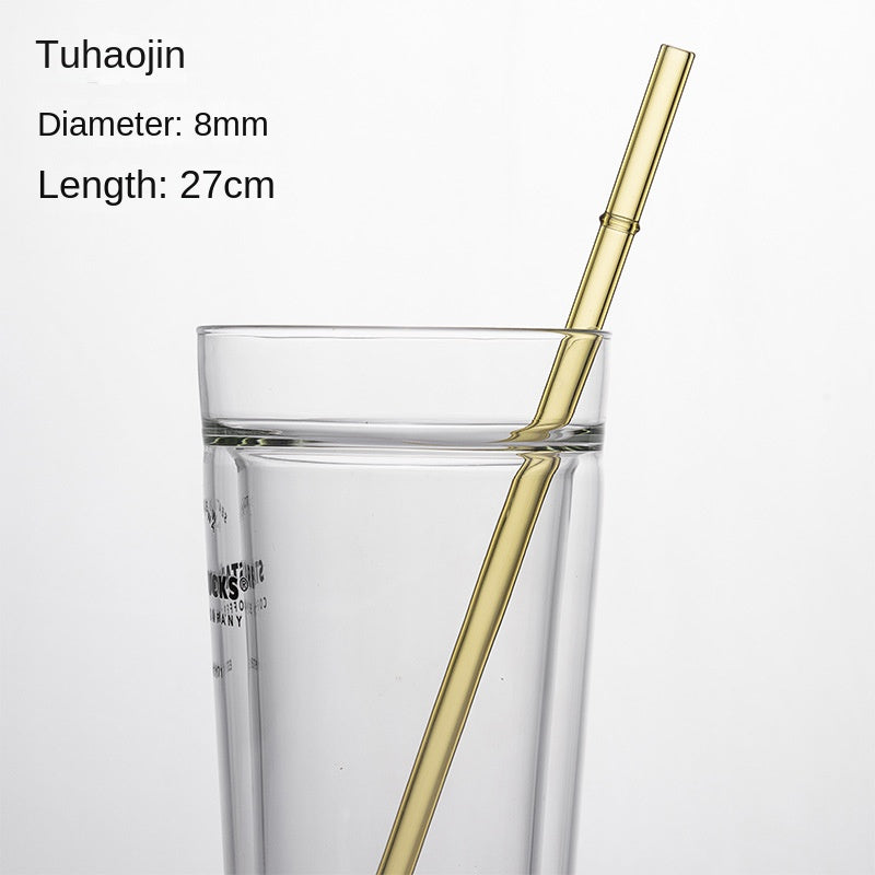 Champagne gold borosilicate glass drinking straw, 8mm diameter, 27cm long, in a glass