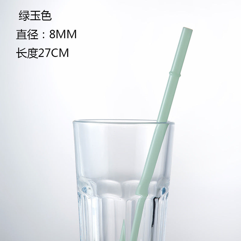 Borosilicate glass drinking straw, teal green, 8mm dia, 27cm long in clear tumbler
