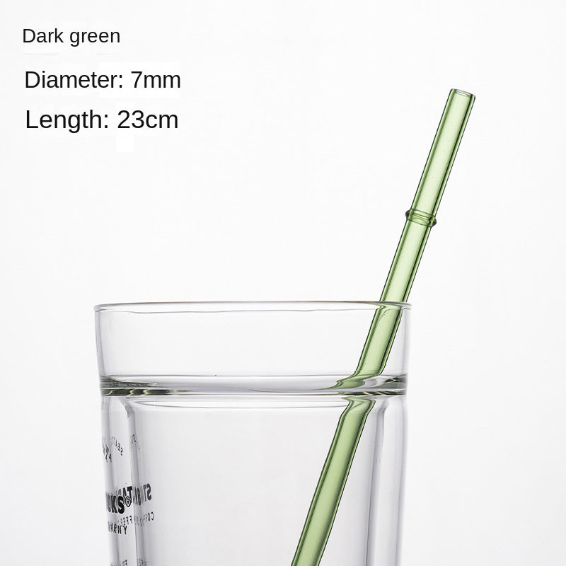 Borosilicate glass drinking straw, dark green, 7mm dia, 23cm long in clear tumbler