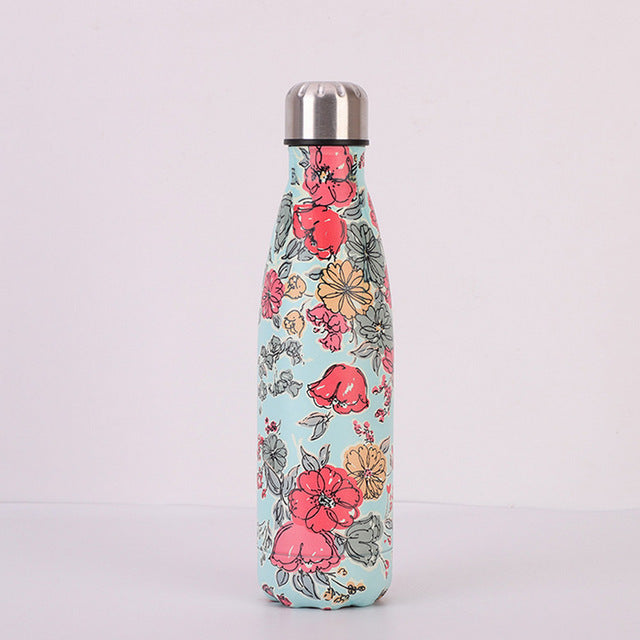 500ml vacuum insulated water bottle with pink floral and bird print and stainless cap