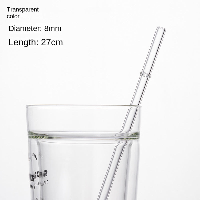 Transparent borosilicate glass drinking straw, 8mm diameter, 27cm long, in a glass