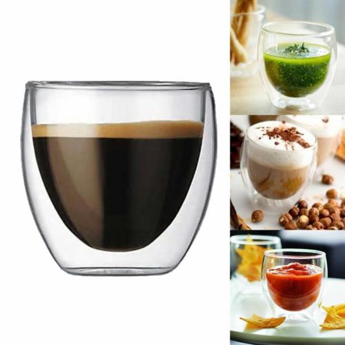 Clear double-wall glass mug with layered dark coffee and light foam line