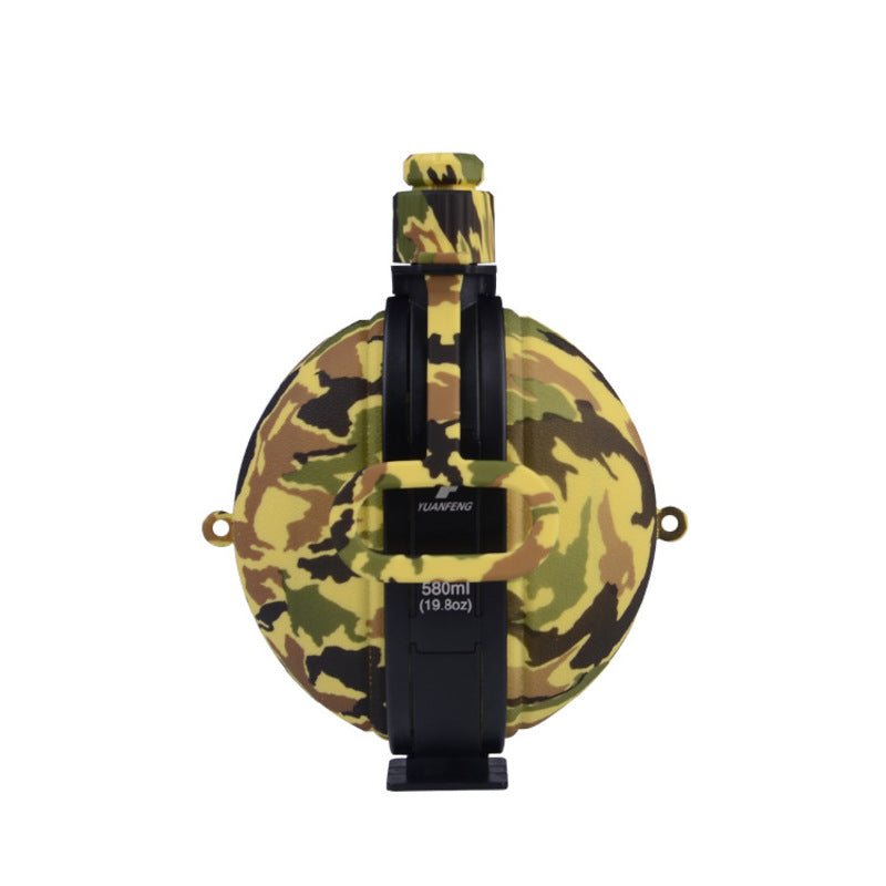Camo yellow 580ml folding silicone water bottle with black holder, spout, and side carry loops