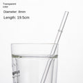 Transparent borosilicate glass drinking straw in a clear cup with water