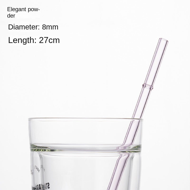 Light purple borosilicate glass drinking straw, 8mm diameter, 27cm long, in a glass