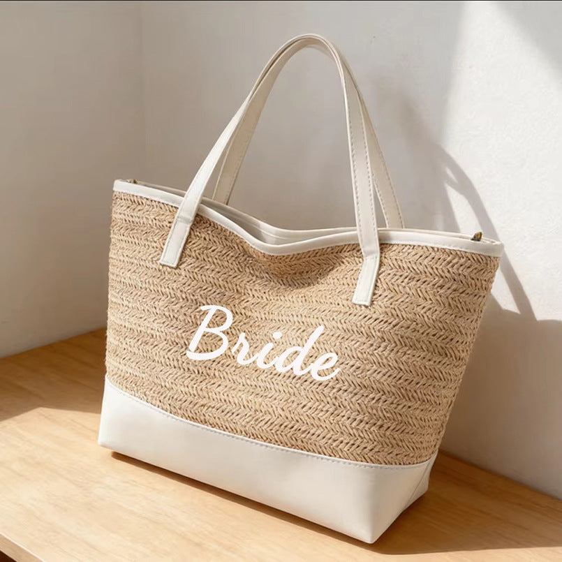 Light khaki woven tote bag with white lining, 'Bride' print, long handles