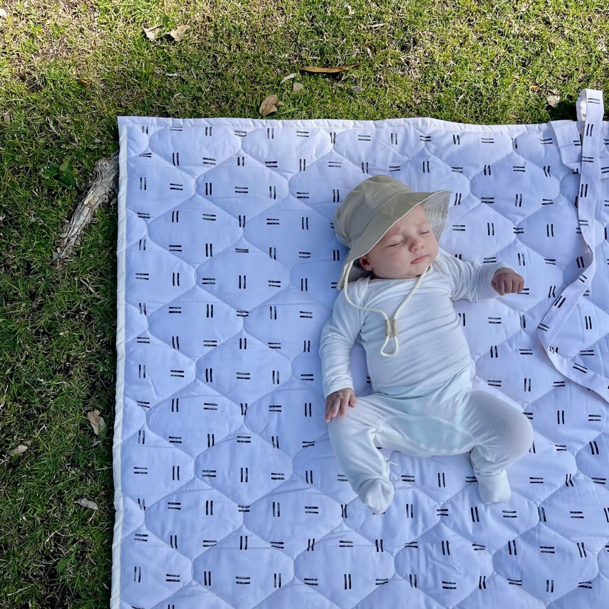 Extra-large waterproof picnic blanket, light blue with repeating black mudcloth pattern