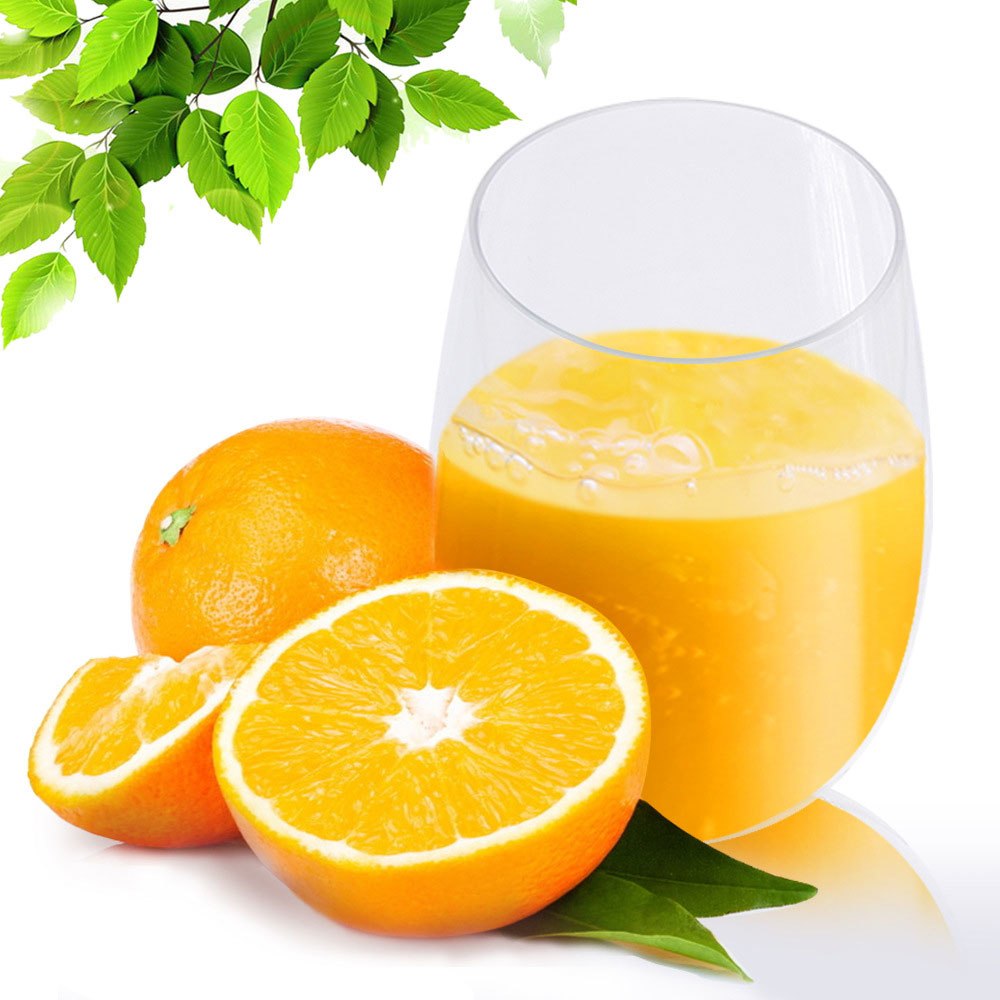 Clear stemless wine glass filled with orange drink beside citrus fruit