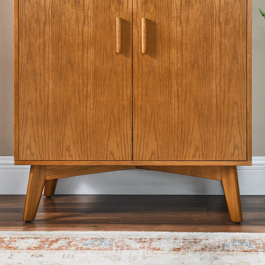 Wood cabinet doors with vertical handles and tapered legs, front view