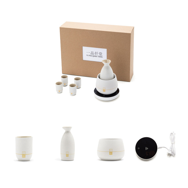 Ceramic electric wine warmer set with heating base, bottle warmer, and small cups in box