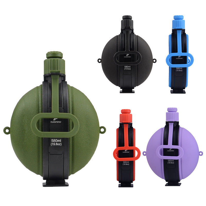 Folding silicone water bottles in assorted colors, 580ml, compact round shape with black holder