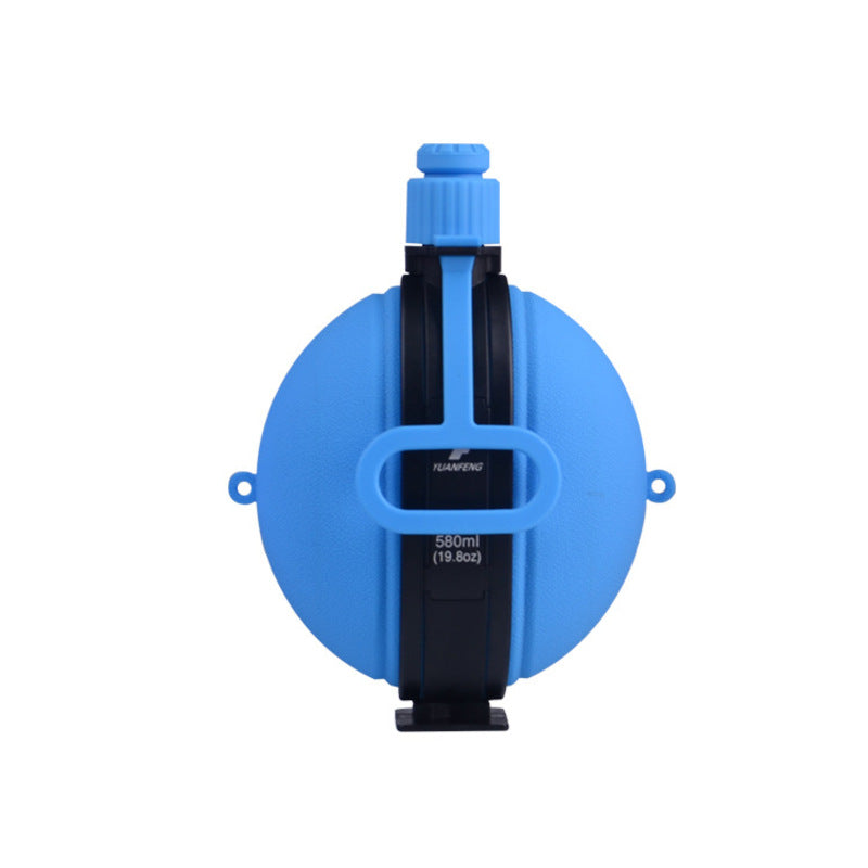 Blue 580ml folding silicone water bottle with black holder, spout, and side carry loops