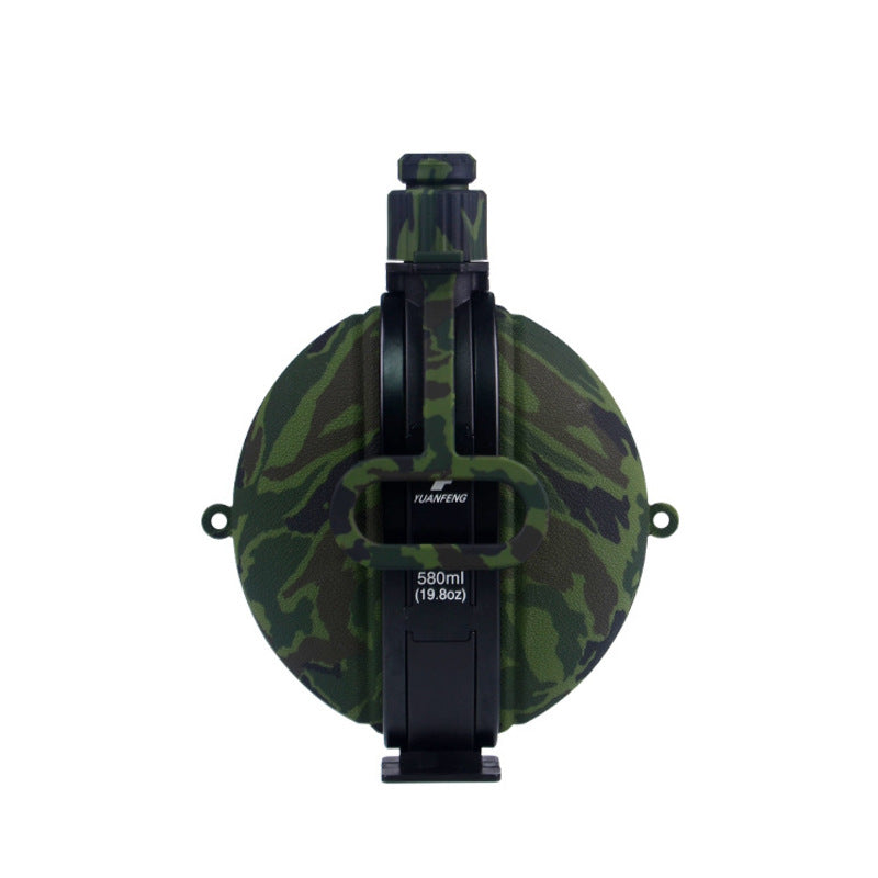 Camo green 580ml folding silicone water bottle with black holder, spout, and side carry loops