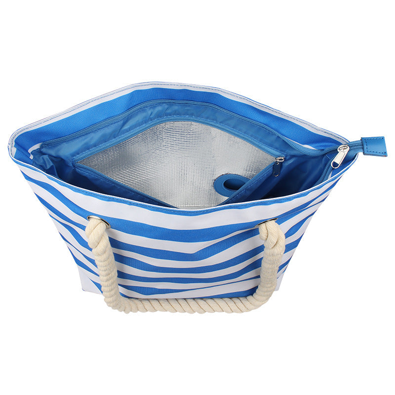 Open blue-and-white striped insulated tote bag with zip top, rope handles, and mesh lining.