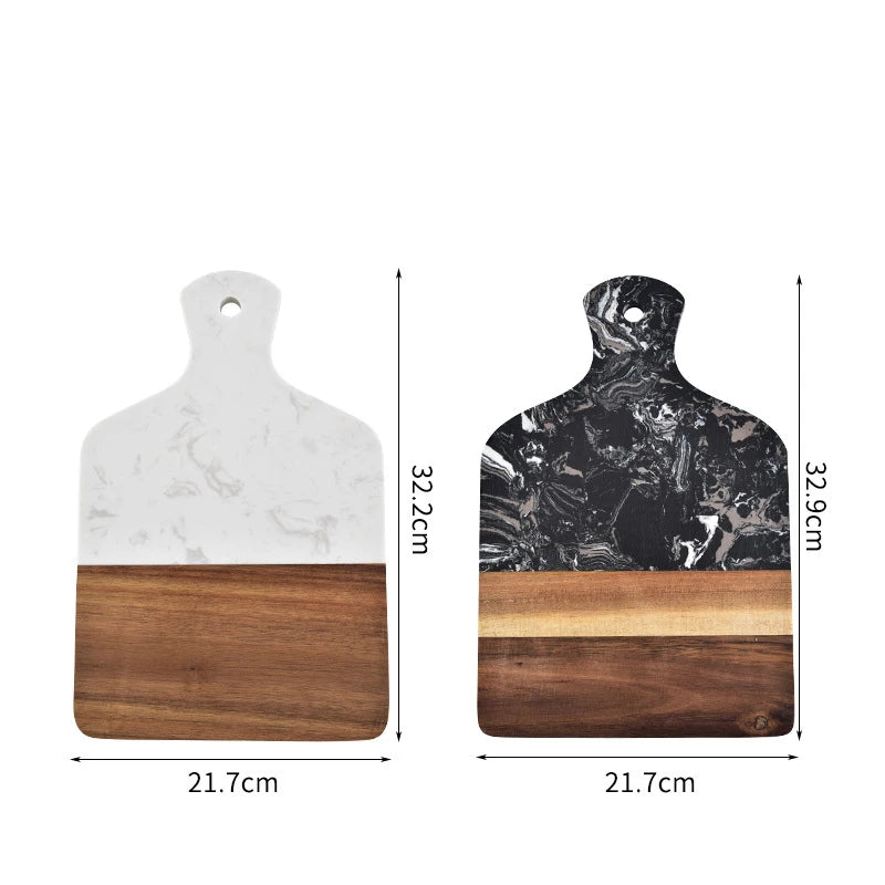 Marble and acacia cutting board set with black and white stone faces and brown wood bottom