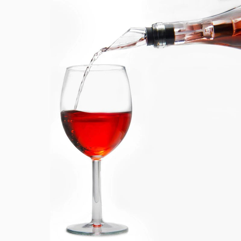 Stainless steel cooling bar pourer pouring red wine into a glass from bottle neck
