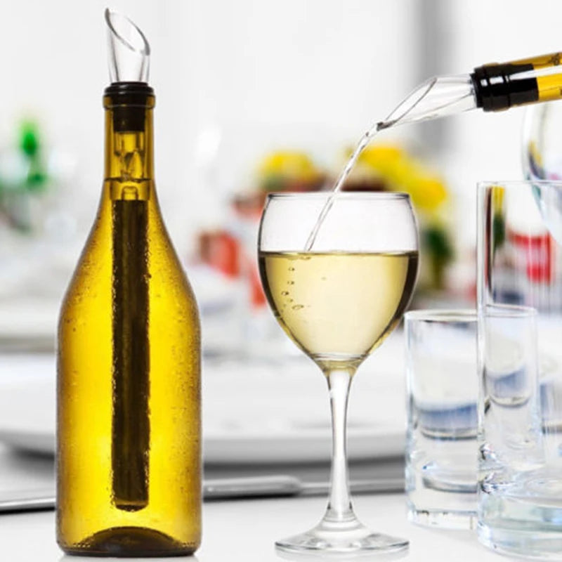 Stainless steel cooling bar with pour tube inserted in bottle, filling a wine glass