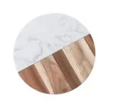 Small round marble-and-wood serving board with marble half and wood segment pattern