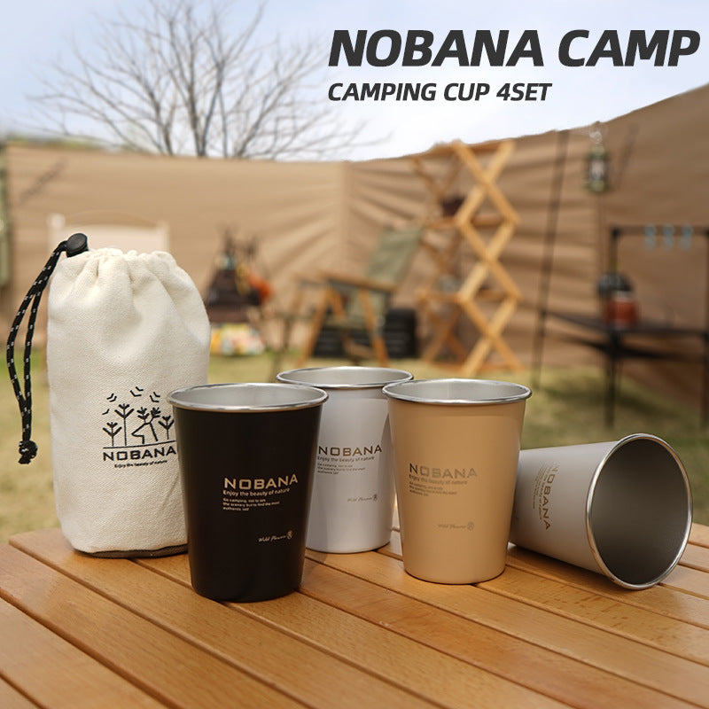 Stainless steel camping mug set with four colored cups and a drawstring storage bag