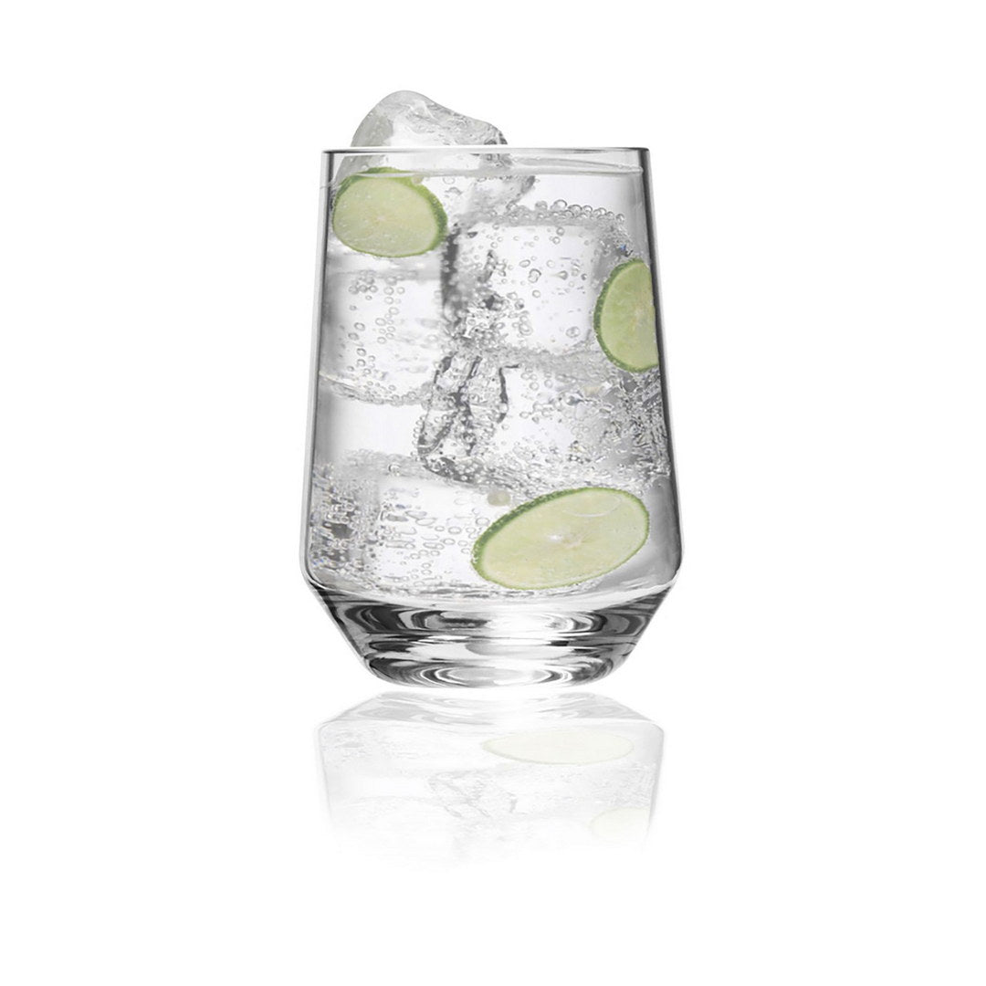 Clear stemmed wine glass with ice and lime slices