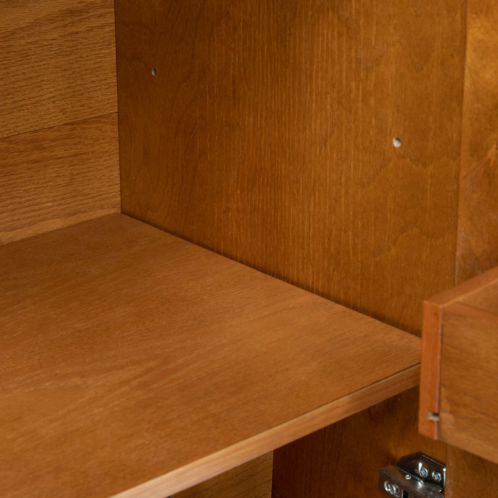 Interior shelf inside wood cabinet with hinge hardware and corner mounting points
